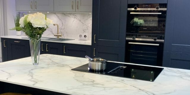 Dark Blue Traditional Kitchen White Worktop