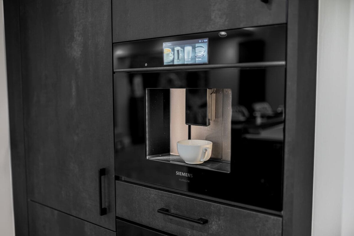 Keller Kitchen in Concrete and Black Metal 7 showing Siemens refreshment appliances by Mike Hughes Fitted Interiors