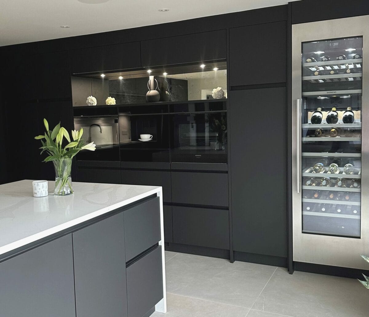 Studio Line Built in Appliances with Black handleless kitchen from Mike Hughes Fitted Interiors edited