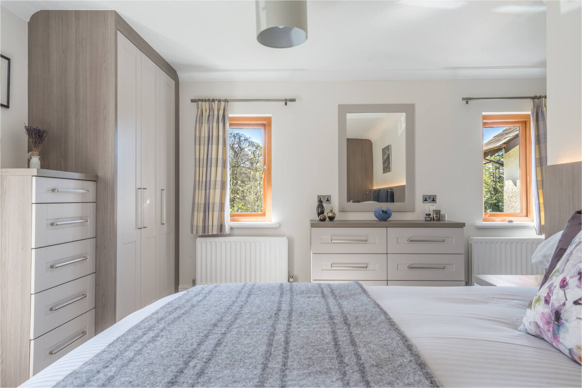 Light Cashmere & Smoked Oak Bedroom in Ambleside Dressing Space deisgned to personalise the room